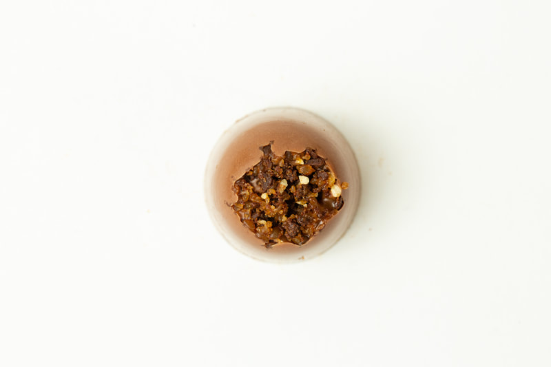 Milk chocolate filled with creamy milk ganache and topped with bits of our signature butter toffee.
